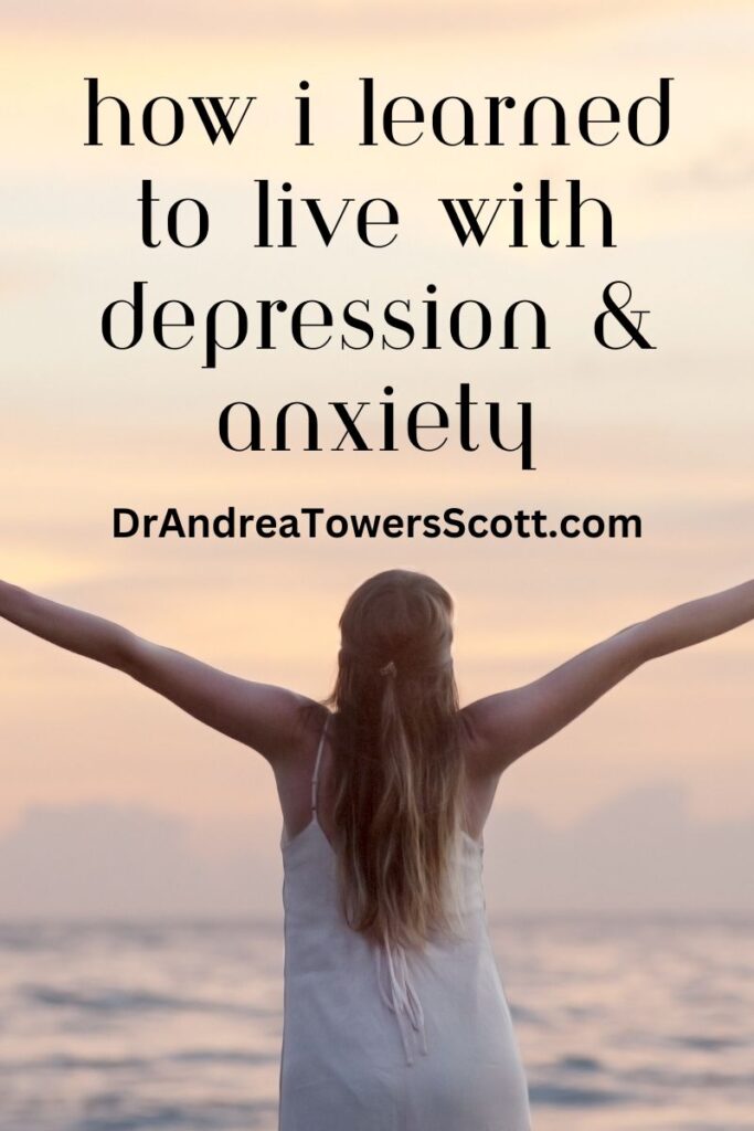 woman standing at the ocean with her arms lifted high in praise. Title How I learned to live with depression & anxiety and author website dr andrea towers scott dot com